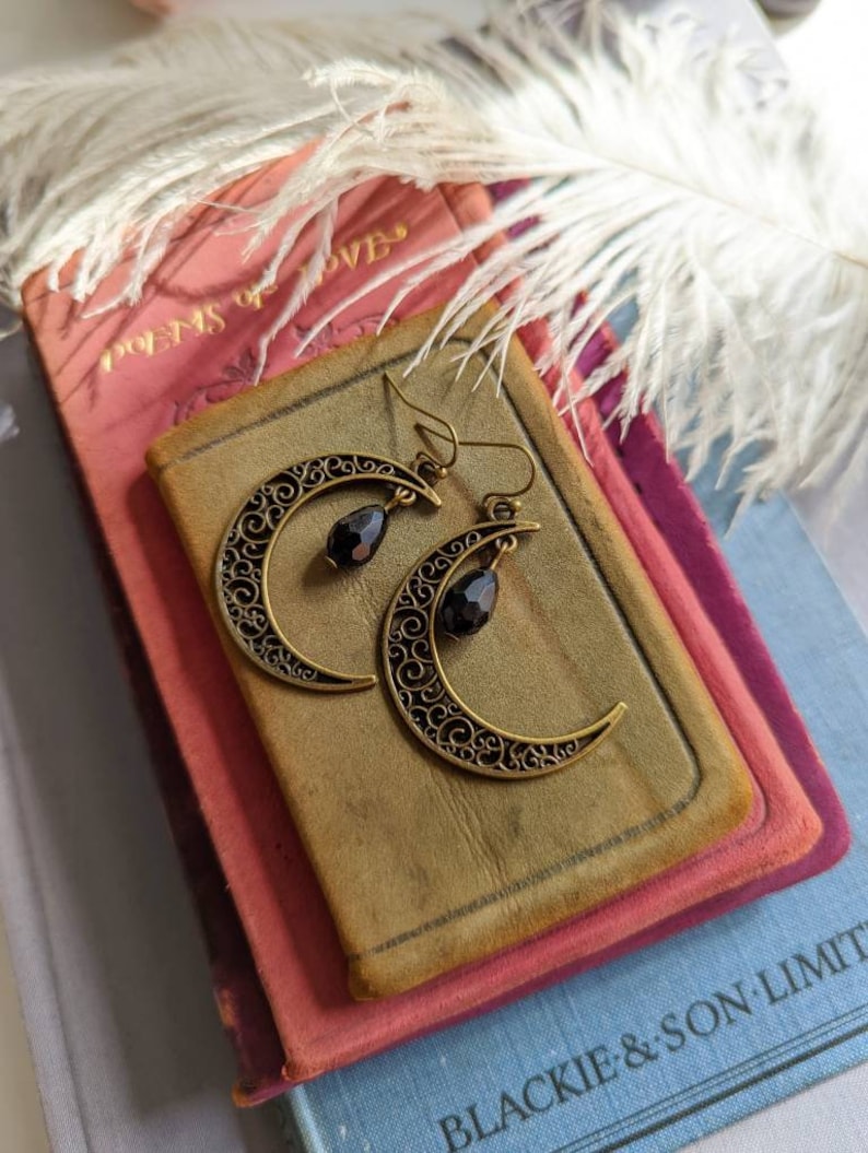 Detail of Faceted Black Glass Teardrop in Bronze Moon Earring
