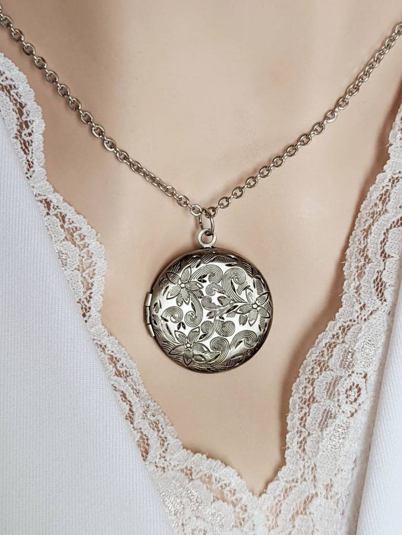 Silver round floral etched locket necklace by Papillion Era