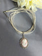 Pink Lady Cameo on Cream Organza Ribbon Choker in Silver Victorian Setting