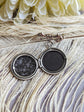 Open view of silver round floral etched locket brooch pin by Papillion Era