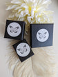 Three black boxes with a butterfly logo on a light background