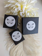 Three black boxes with a butterfly logo on a light background