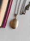 Floral Embossed Oval Locket Necklace: Vintage Style Keepsake Jewelry
