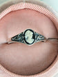 925 Sterling Silver Celtic Knot Cameo Ring - Heritage Style Jewelry with an ivory on black cameo design on a pink cushion