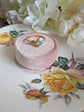 Gold Vermeil Blue Rose Ring - 925 Sterling Silver - Victorian Floral Jewelry on a pink velvet box against a floral background
