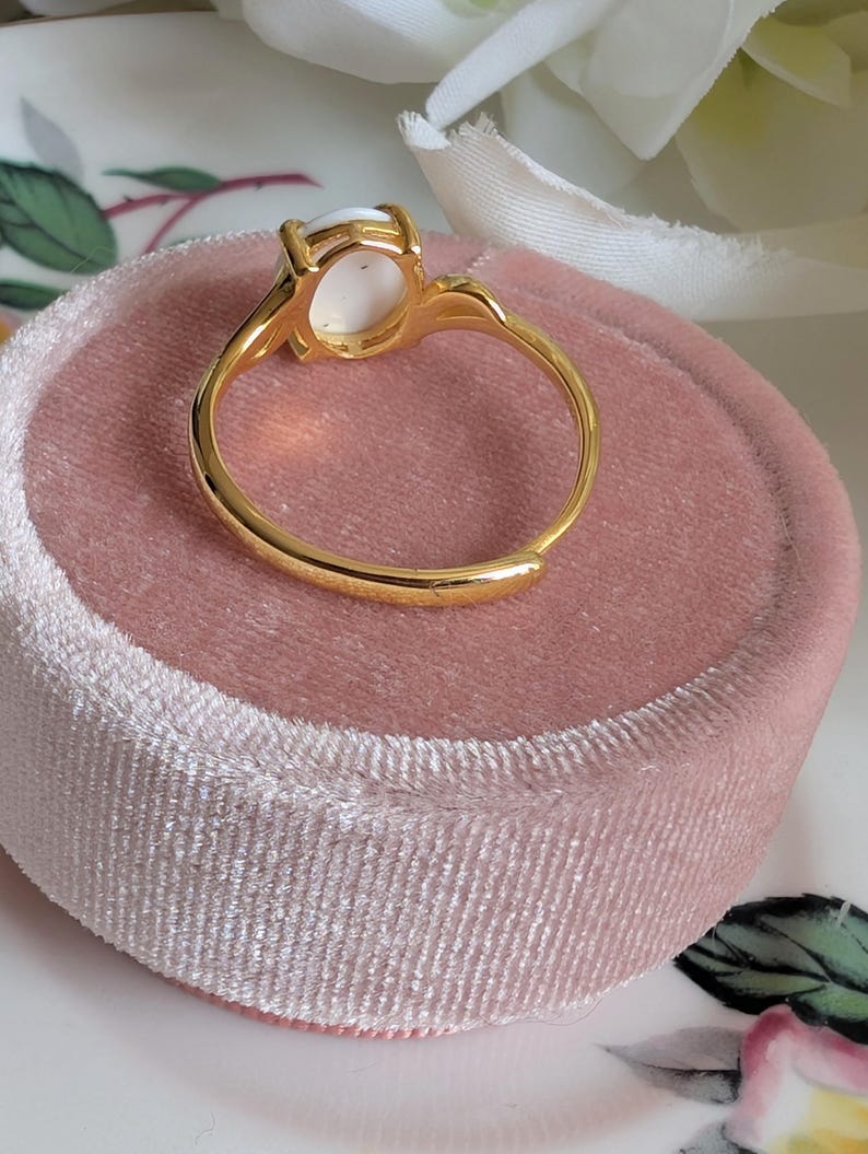 Back view/underside of Gold Vermeil Blue Rose Ring - 925 Sterling Silver - Victorian Floral Jewelry on a pink velvet cushion