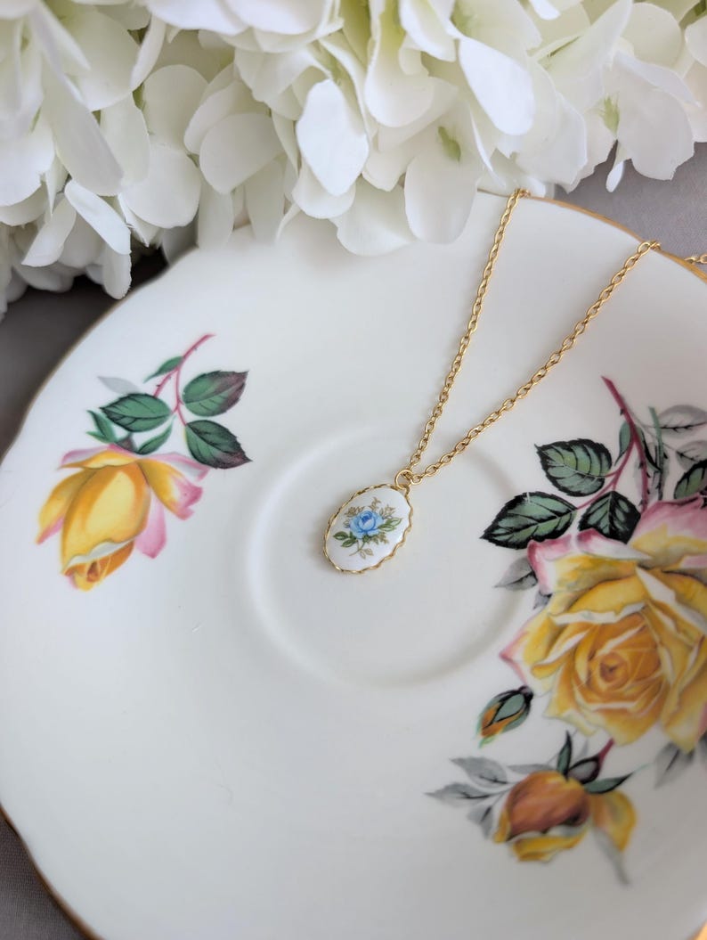 Blue Rose Vintage Porcelain Necklace - 1980s Limoges Style - Brass Setting on a decorative plate with floral design