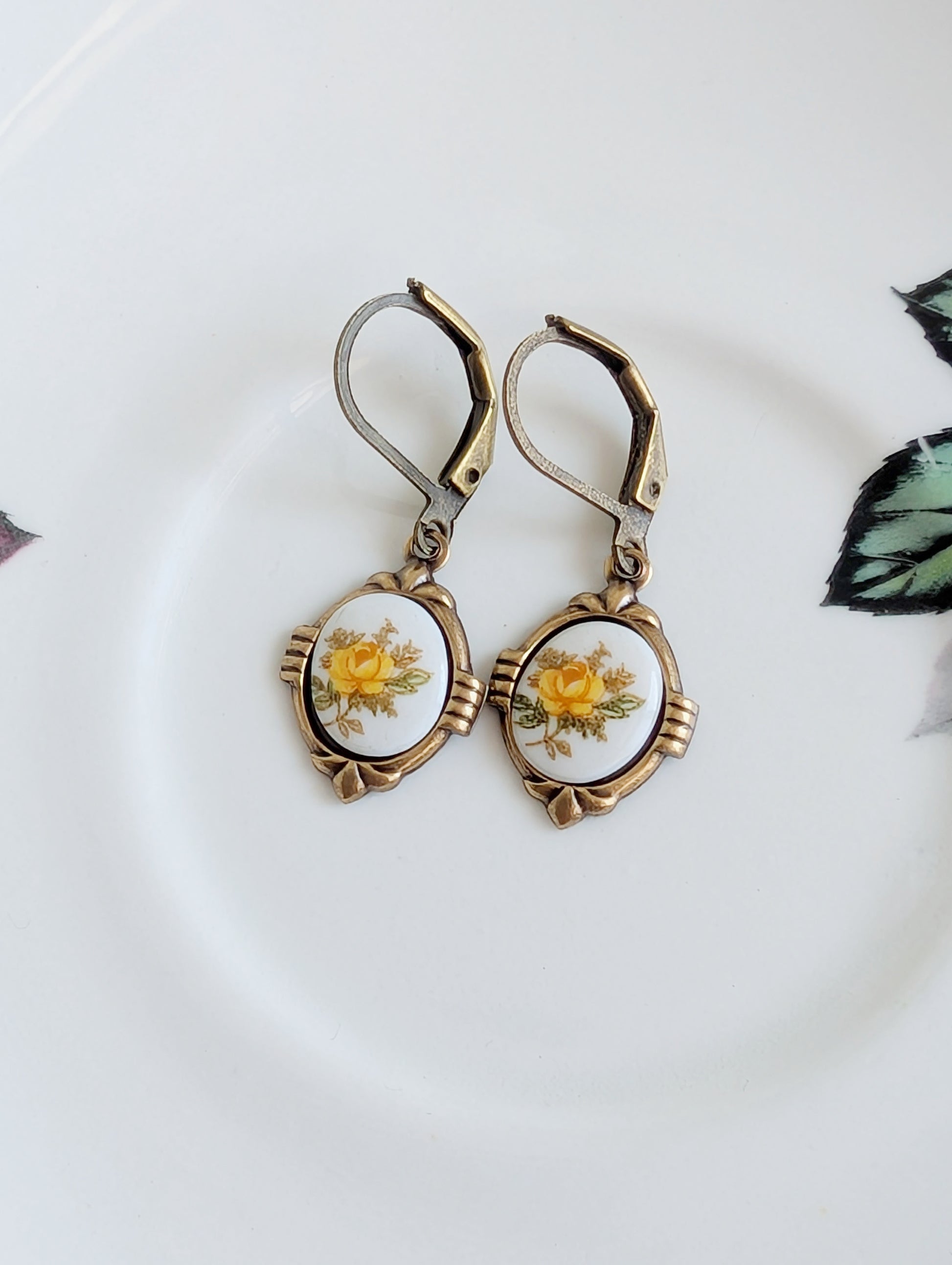Yellow Floral Porcelain Cabochon Earrings - Art Deco Frame - Victorian Style on a white background