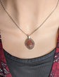 Medium Pink Strawberry Quartz Crystal Necklace - Silver Flourish Pendant Setting being worn by a mannequin.