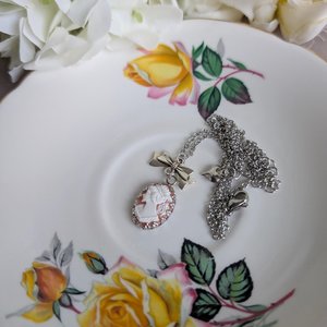 Stainless Steel Cameo Pendant Necklace – White on Pink Lady Cameo with Bow Connector, Vintage Style Jewelry