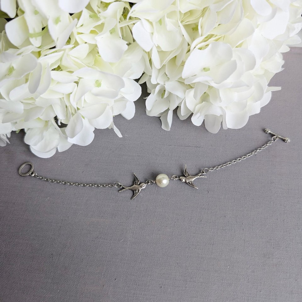 Silver Swallow Bracelet: Glass Pearl Bird Jewelry with Toggle Clasp