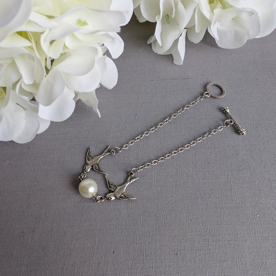 Silver Swallow Bracelet: Glass Pearl Bird Jewelry with Toggle Clasp